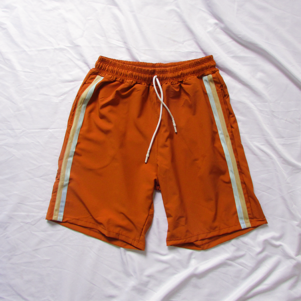 Pantaloneta running man terracota